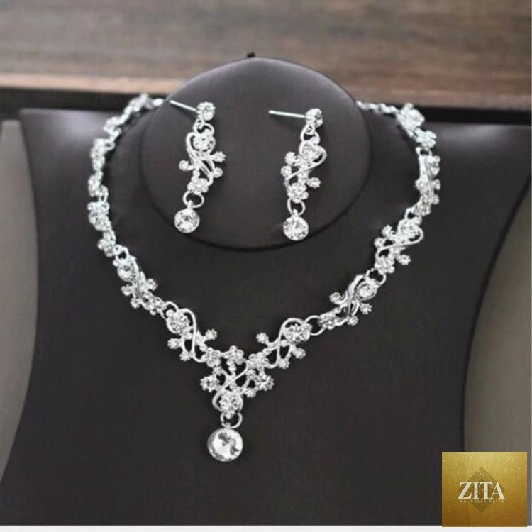 Elegant bridal necklace from MANDOTOS featuring sparkling crystals and intricate design, perfect for wedding accessories.