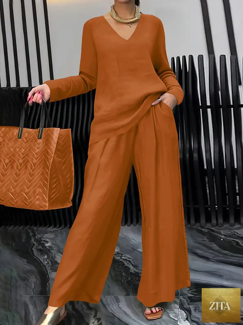 FitiqueFit solid color long sleeve top and pants two-piece travel set, casual and comfortable loungewear outfit.