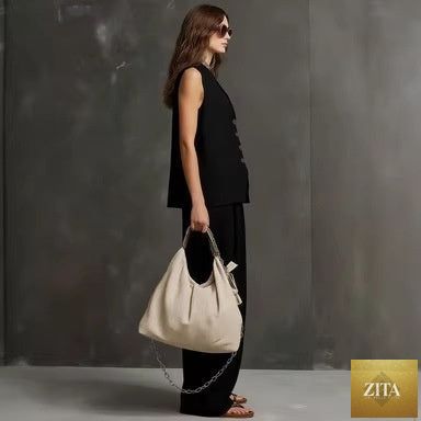 Women's sleeveless vest and wide-leg pants two-piece casualwear set by Zita La Belle Elite in various colors, styled for comfort.