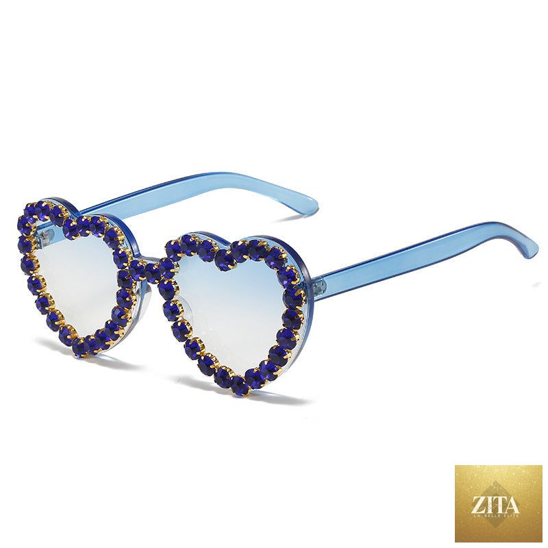 Peach heart-shaped rhinestone sunglasses by FitiqueFit with Y2K INS style, trendy eye wear with sparkling rhinestone details.