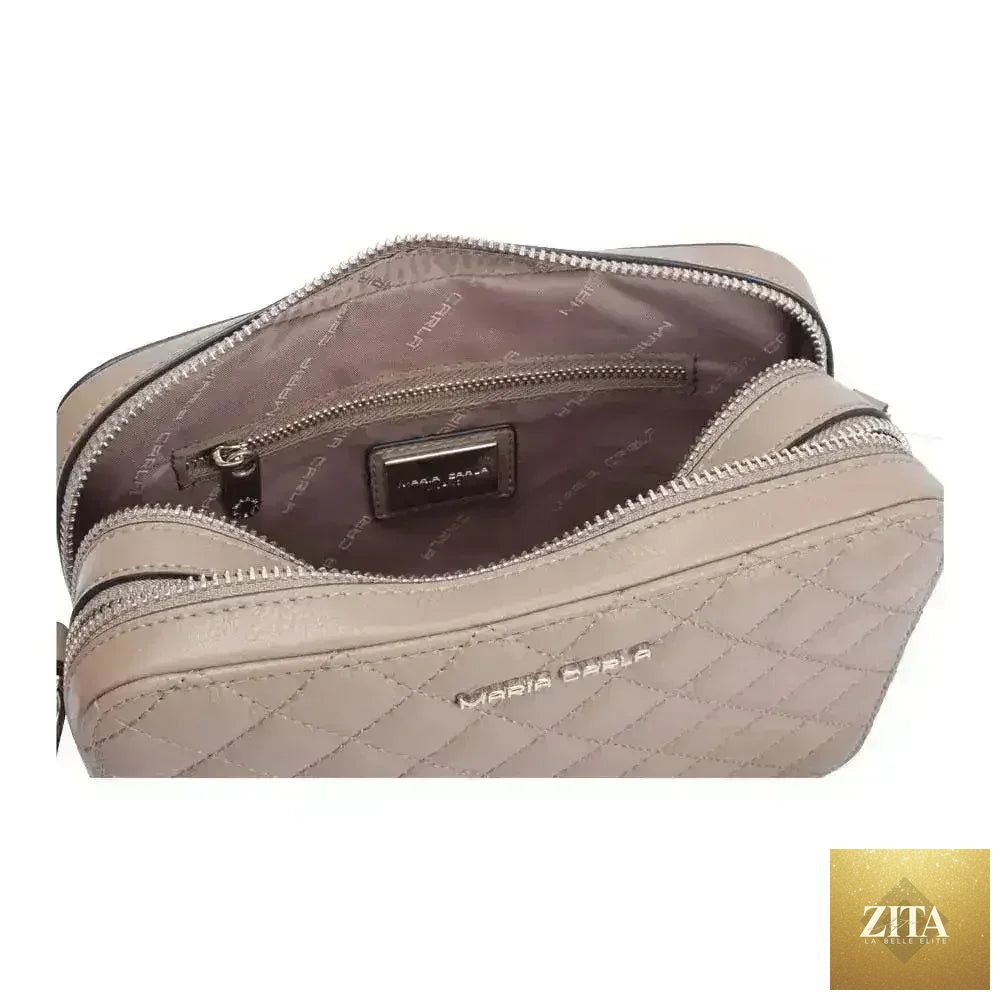 Luxurious Femstylo small leather handbag for women, smooth finish, stylish fashion accessory with elegant design.