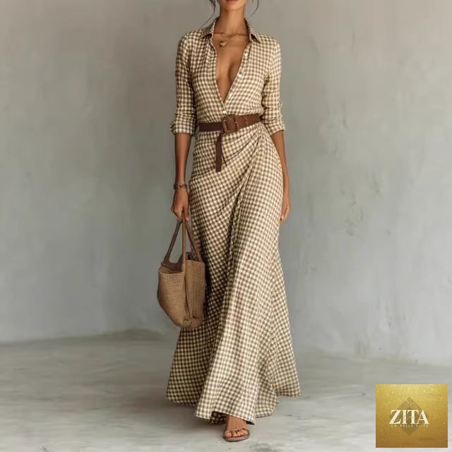 Women's belted irregular pleated dress by FitiqueFit, featuring a flowing silhouette and stylish design, shown in this image.