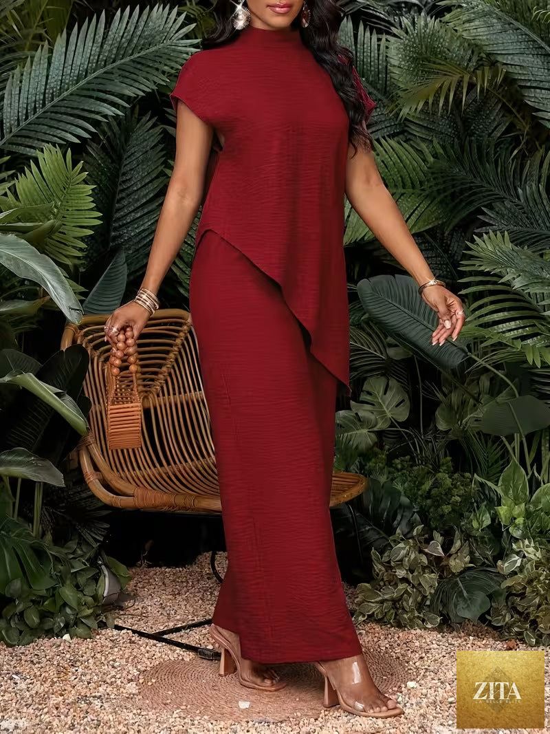 Asymmetrical sleeveless top and matching pants set for women by FitiqueFit, featuring stylish modern design and comfortable fit.