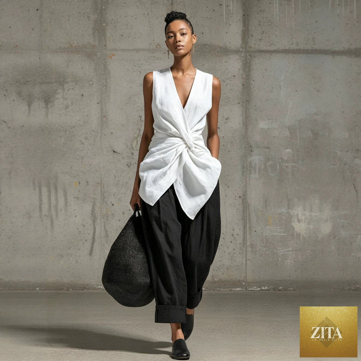 Women's casualwear set from FitiqueFit featuring a tie-front V-neck sleeveless top and wide-leg pants in soft fabric.