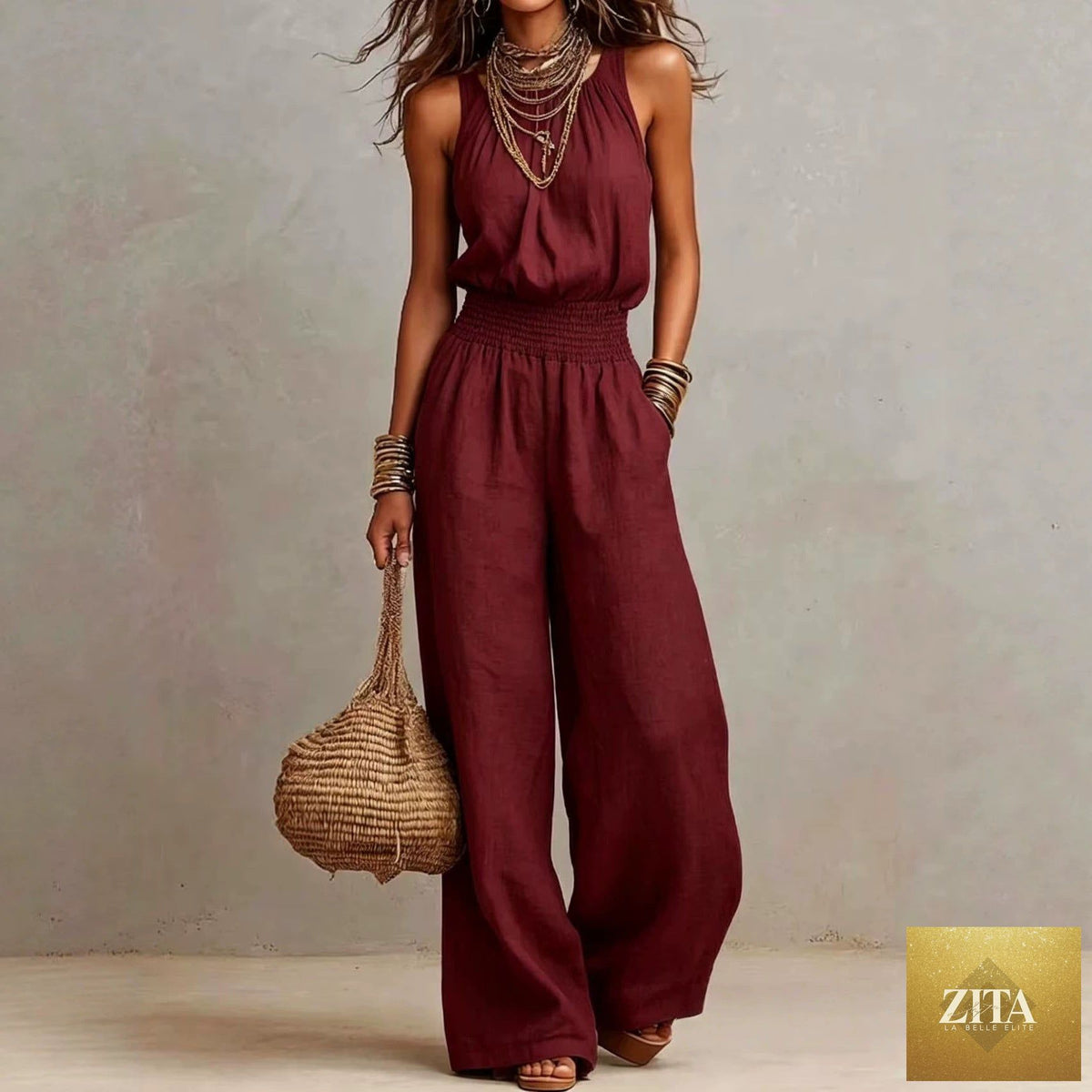 Women's black halter-neck backless wide-leg jumpsuit by FitiqueFit, featuring solid color street style design.