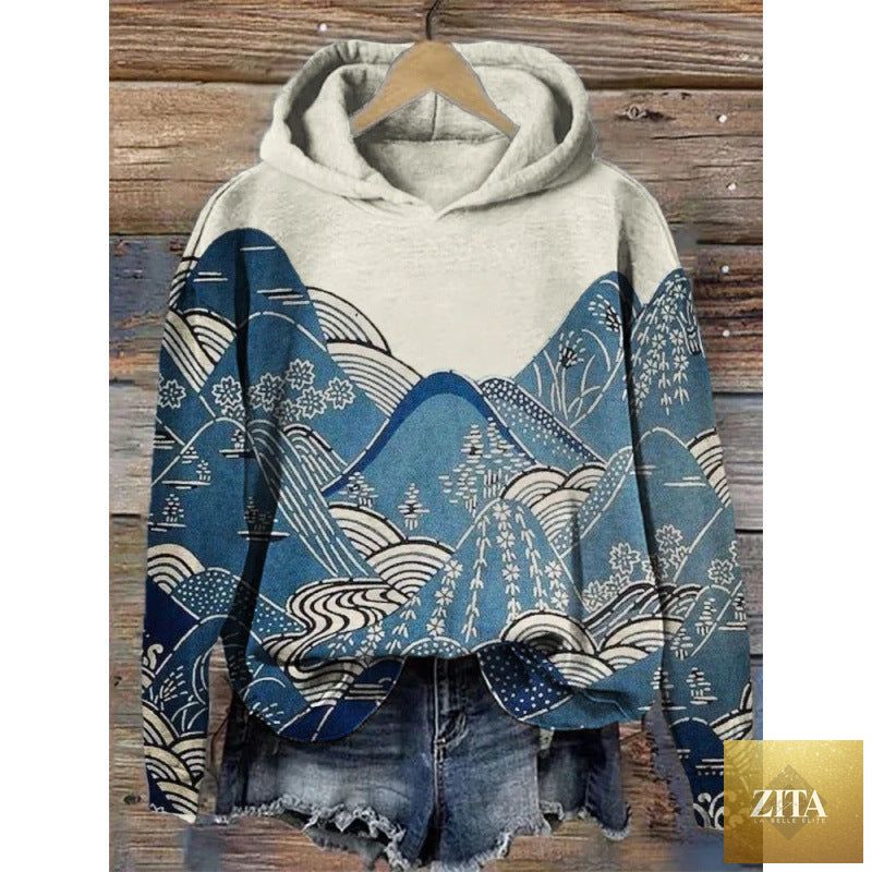 Women’s printed hooded long sleeve sweatshirt from FitiqueFit, featuring a colorful pattern and cozy hooded design.
