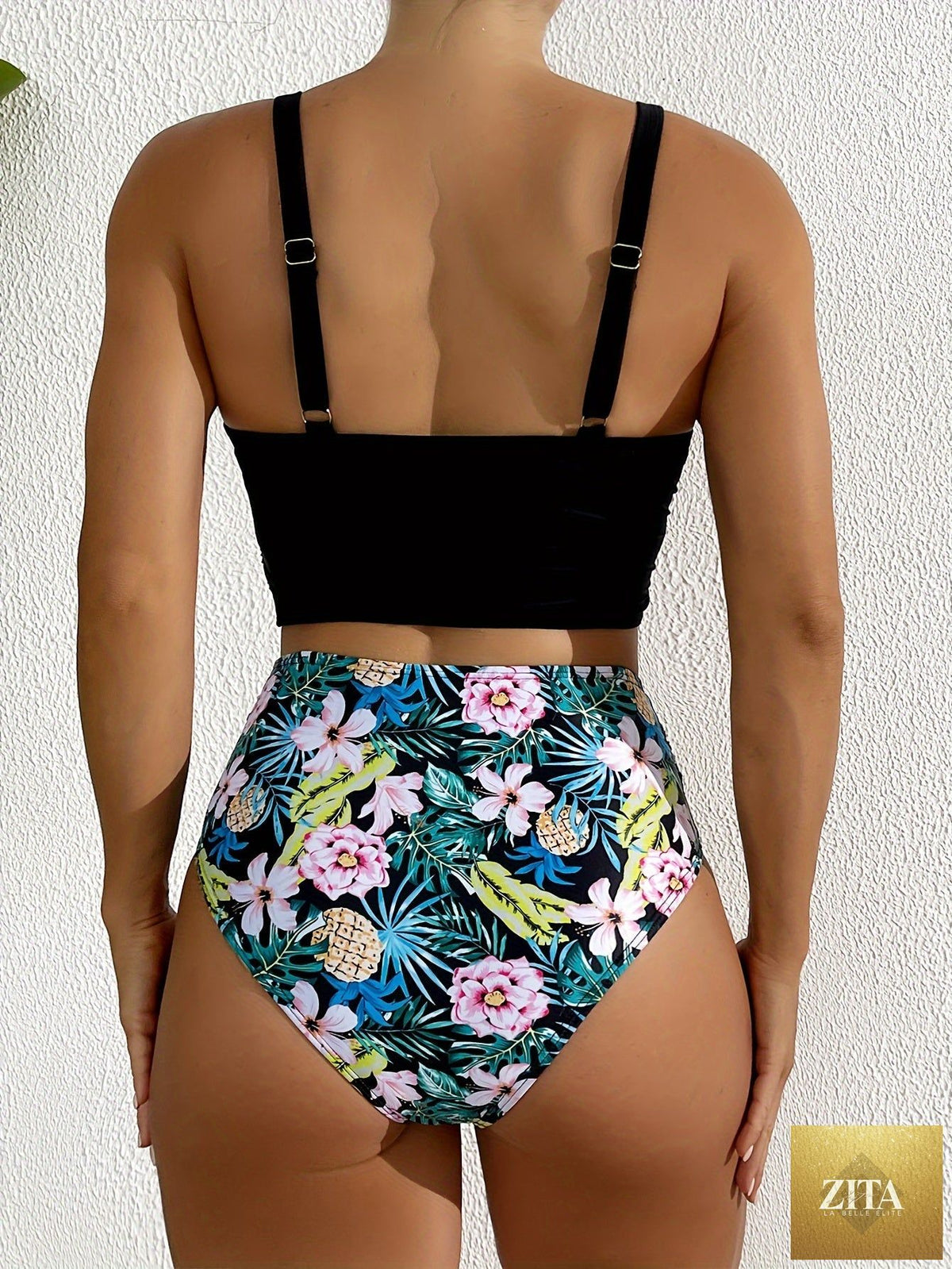 Black Stevvex bikini set with twist front, high waist, V neck, ruched tummy control, and cross strap detail for beach or pool.