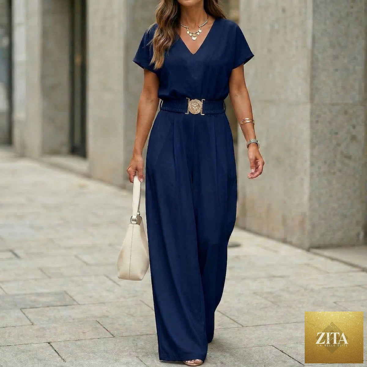 Women's FitiqueFit V-neck belted wide-leg jumpsuit, casualwear with a relaxed fit and stylish design, shown in beige fabric.