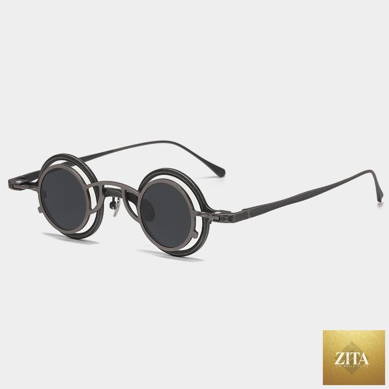 Pure titanium small round sunglasses from FitiqueFit with retro luxury design, featuring sleek round frames and dark tinted lenses.