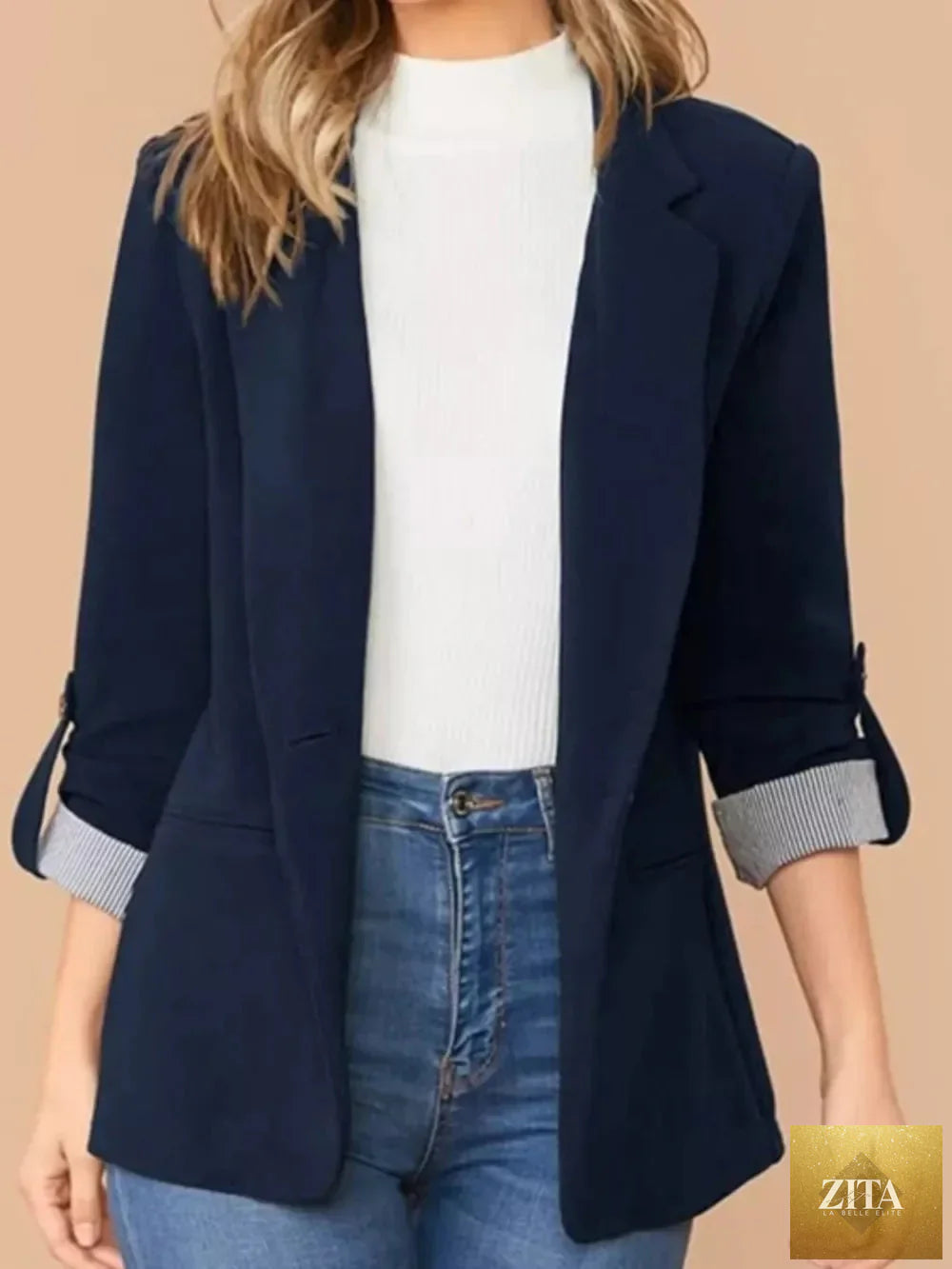 SITRA lapel collar blazer with roll-tab sleeves, tailored fit, and classic design in neutral fabric, perfect for office or casual wear.