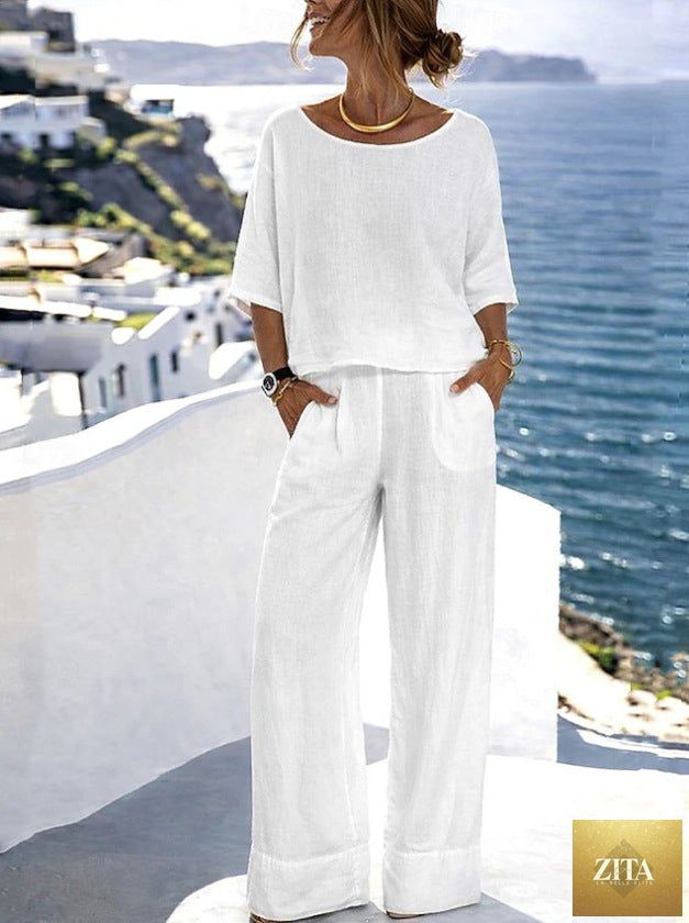 Women's cotton linen resort set by Zita La Belle Elite, featuring a short sleeve top and wide-leg pants in light, breathable fabric.