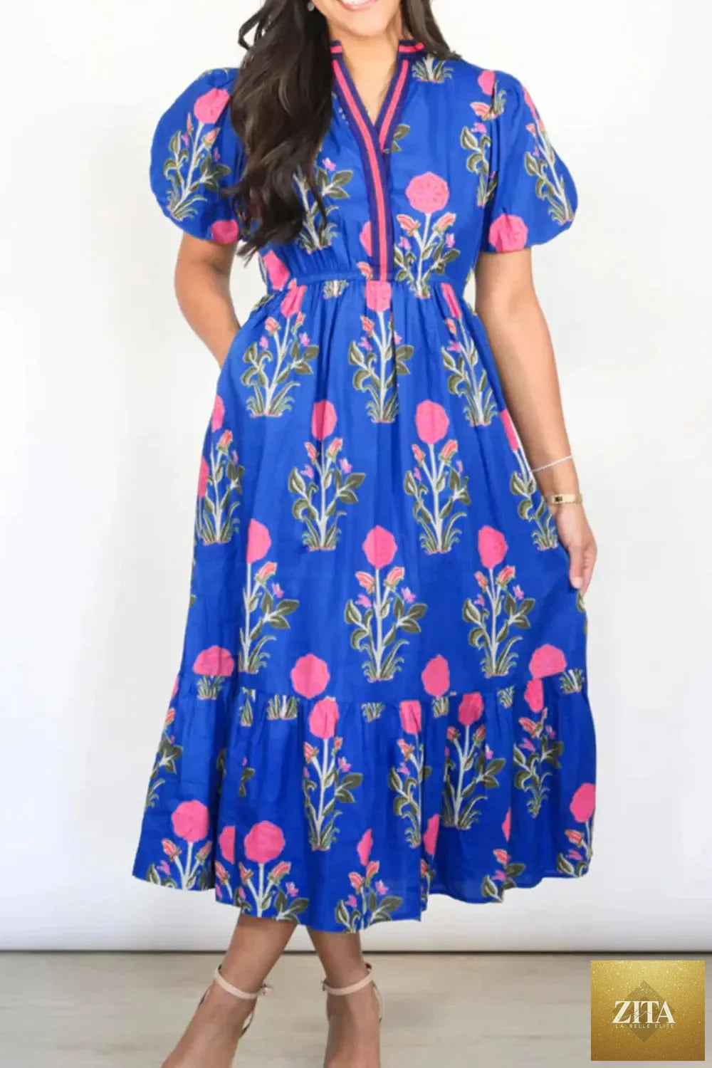 Floral puff short sleeve high waist dress with notched neckline, stylish and feminine from Shopiebay, displayed on a hanger.