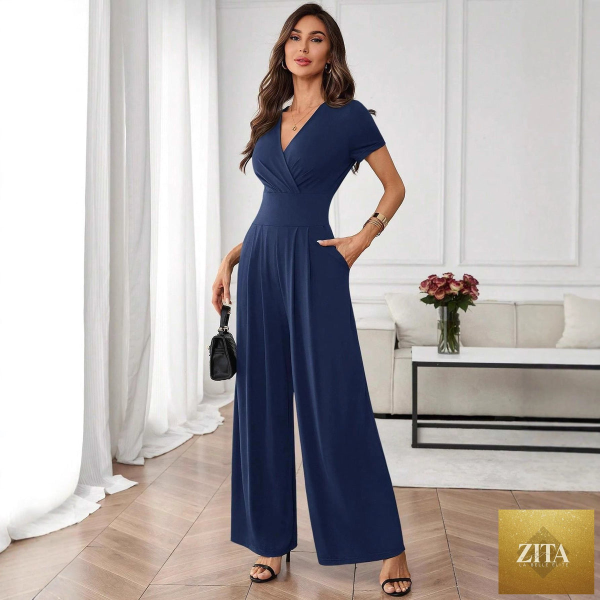 Three-quarter sleeve pleated wide-leg jumpsuit by FitiqueFit, shown in two color options, front view with relaxed fit.