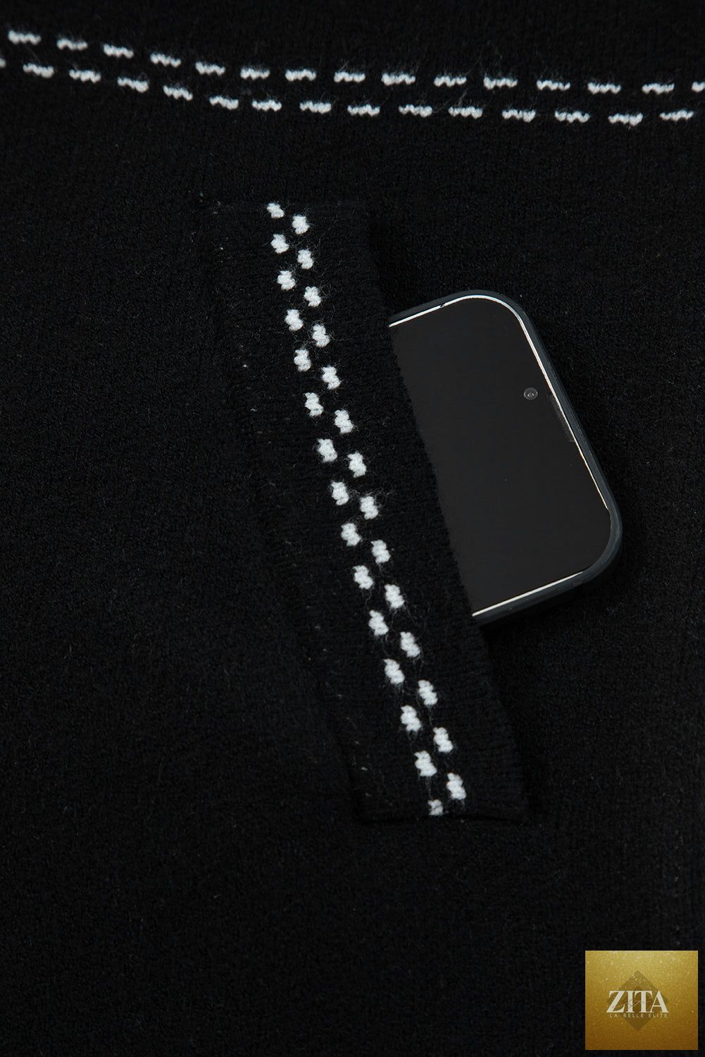 Black contrast trim button-up sweater cardigan from Wild and Free Boutique, showcasing a cozy knit with front buttons and sleek design.