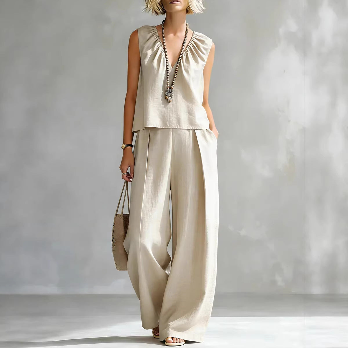 Women's sleeveless cotton-linen casual wear set by FitiqueFit, featuring a relaxed shirt and matching pants in a stylish urban design.