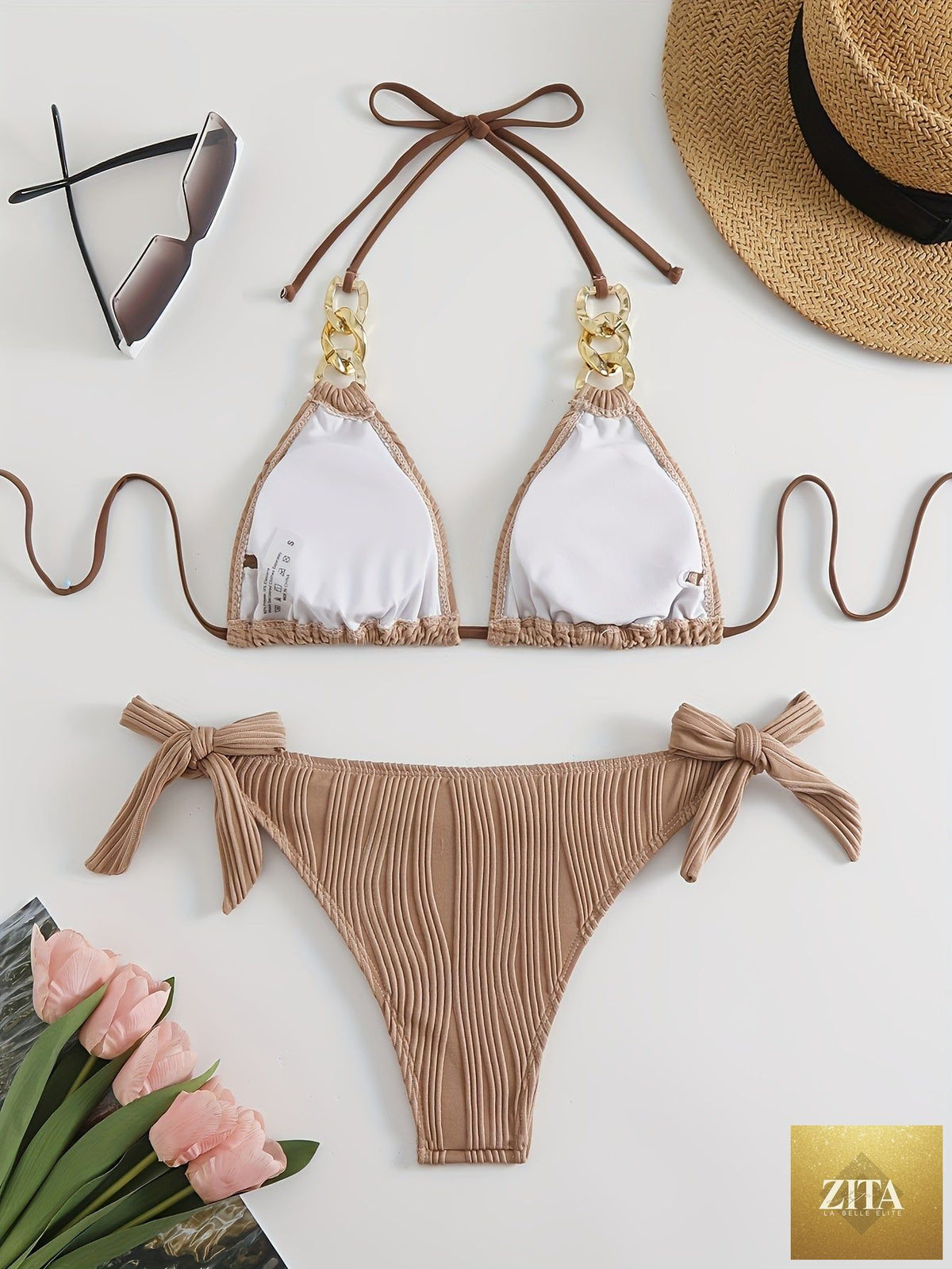 Stevvex striped halter bikini set with ruched texture, golden chain detail, bow tie sides, and elegant ring links, perfect for summer.