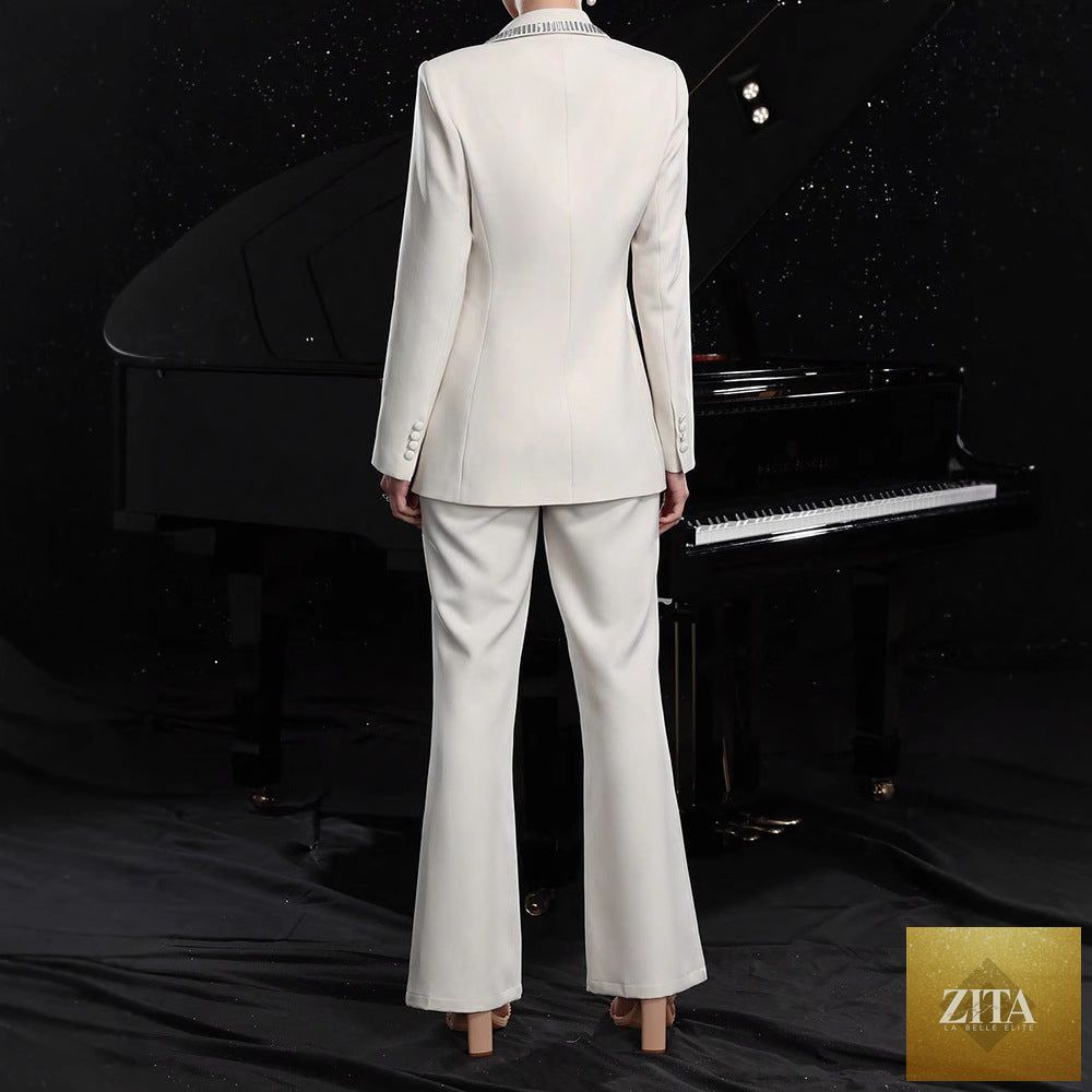 Women's elegant hollow-out long-sleeve suit jacket and pants set by FitiqueFit, featuring stylish design and tailored fit.