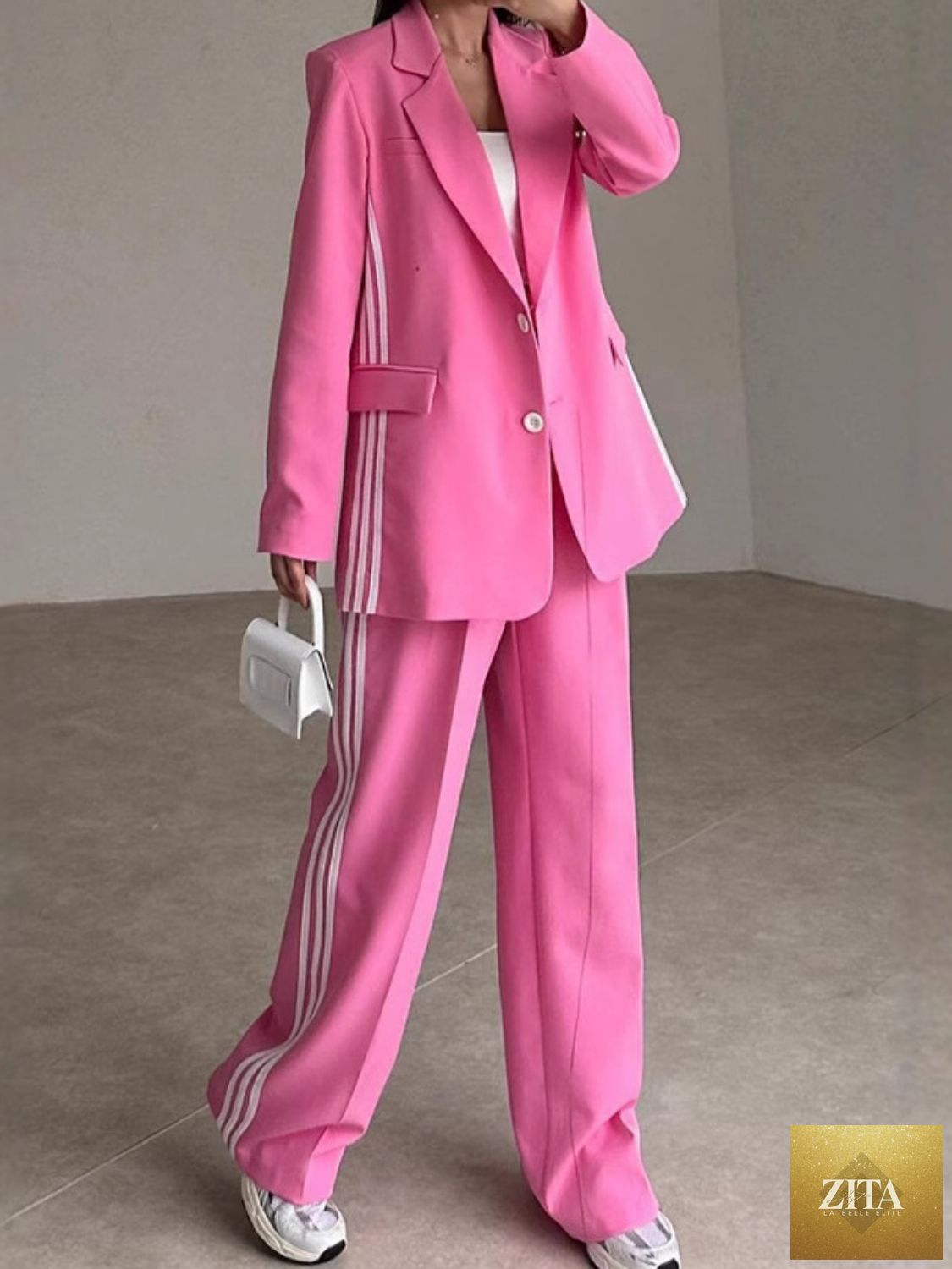 Wild and Free Boutique side-striped long sleeve blazer and matching pants set, stylish and comfortable for casual or semi-formal wear.