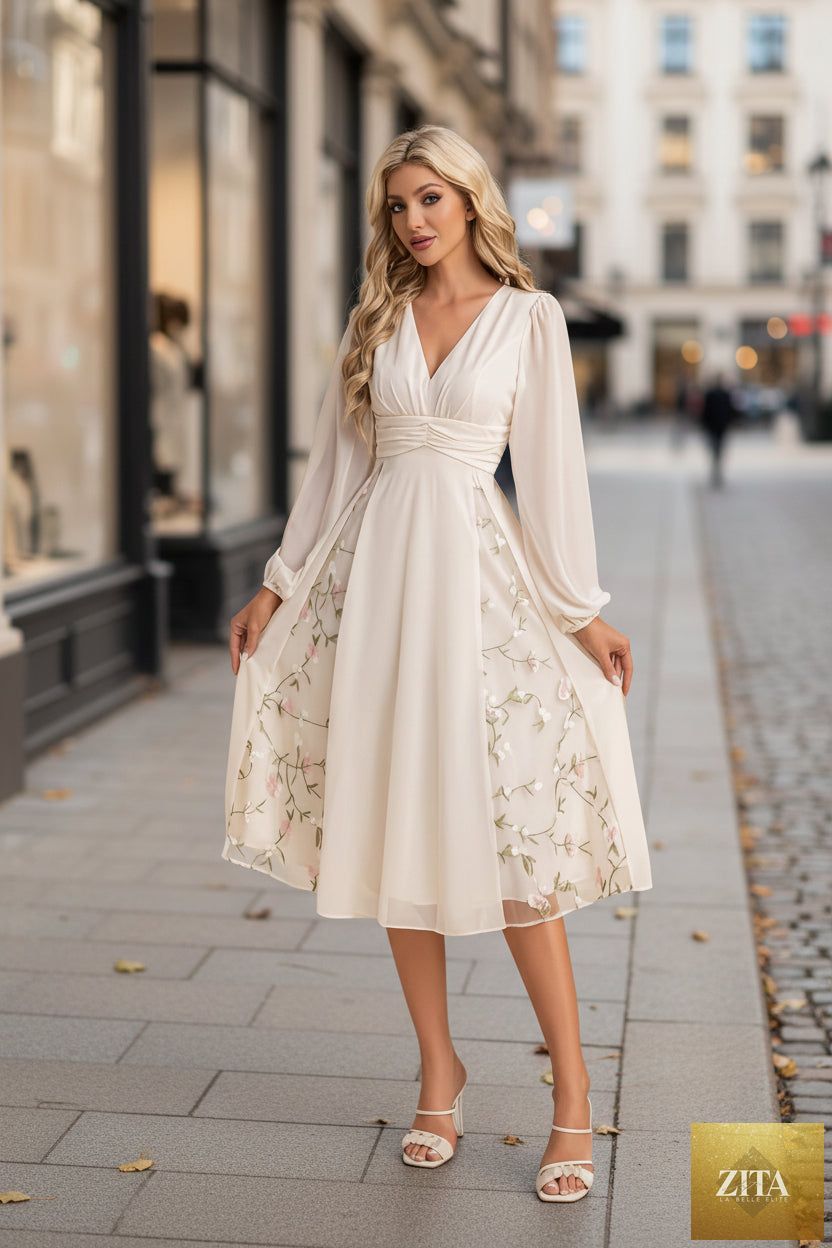 Floral long sleeve v-neck pleated midi dress by FitiqueFit, featuring high waist and flared hem for casual wear.