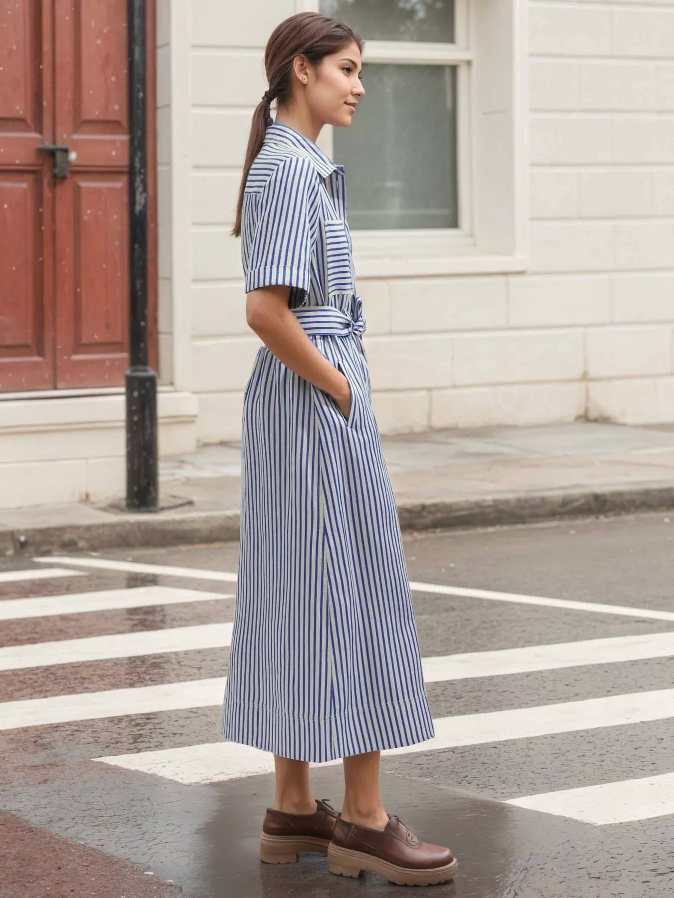 Striped button-front shirt dress by Shopiebay featuring a classic collar, long sleeves, and a relaxed fit for casual wear.