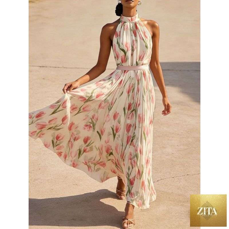 Women's halterneck high-waist swing dress by FitiqueFit featuring floral and solid print casualwear, shown with a flowing silhouette.