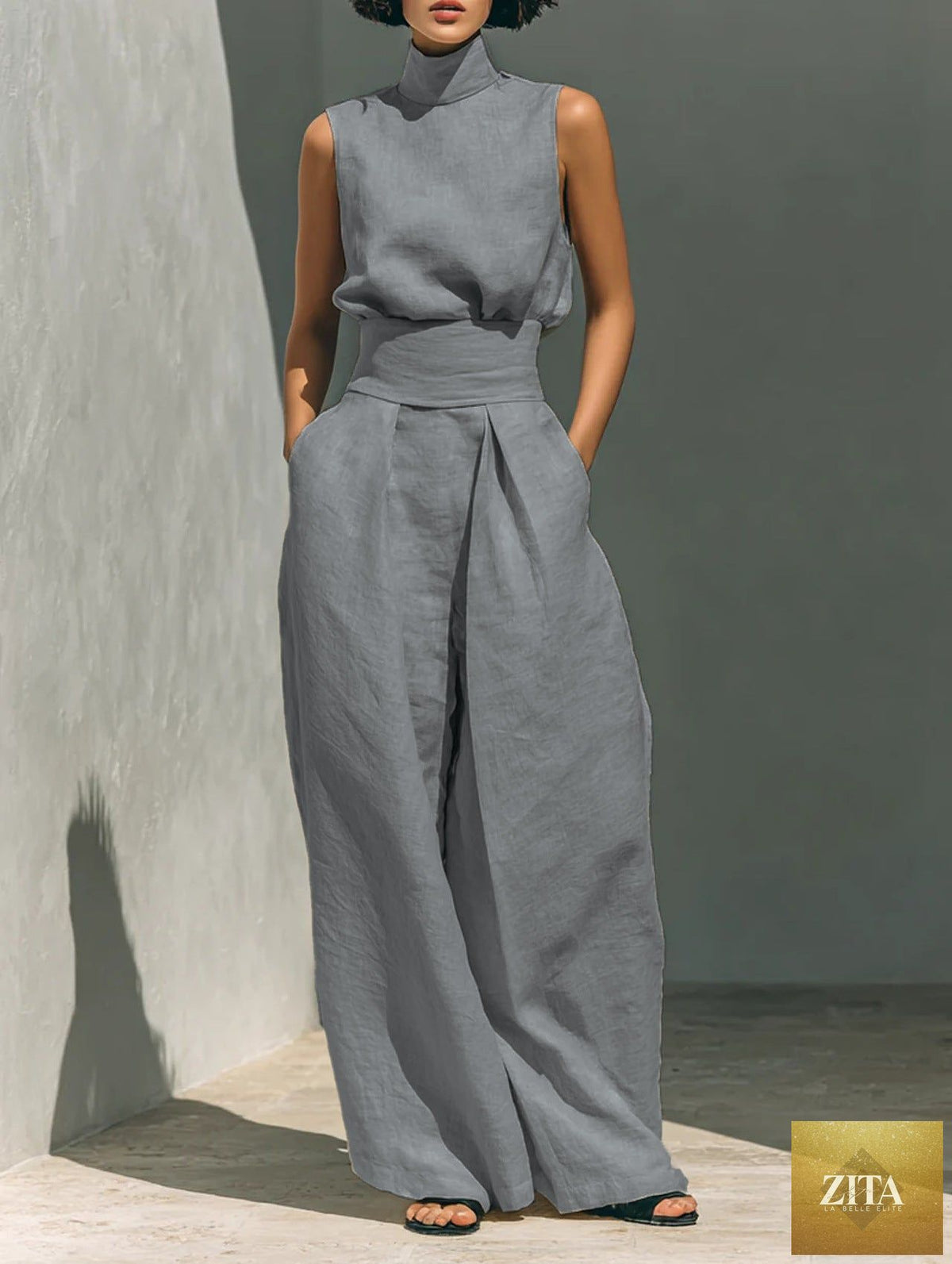 Casual sleeveless summer suit featuring a stand-up collar pullover top and loose straight-leg trousers for women.