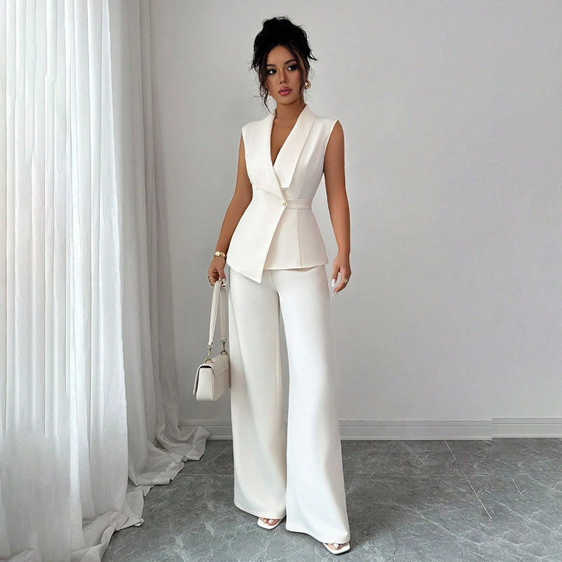 Women's sleeveless blazer and straight-leg pants two-piece casualwear set by FitiqueFit, shown in a stylish, coordinated outfit.