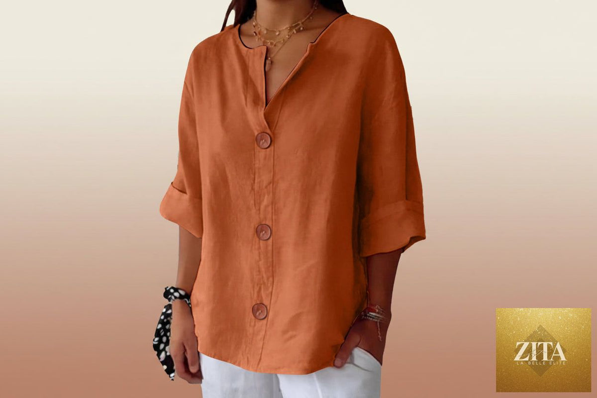 Women's V-neck cotton linen blouse with button details, casual FitiqueFit top shown in a relaxed fit and natural fabric texture.