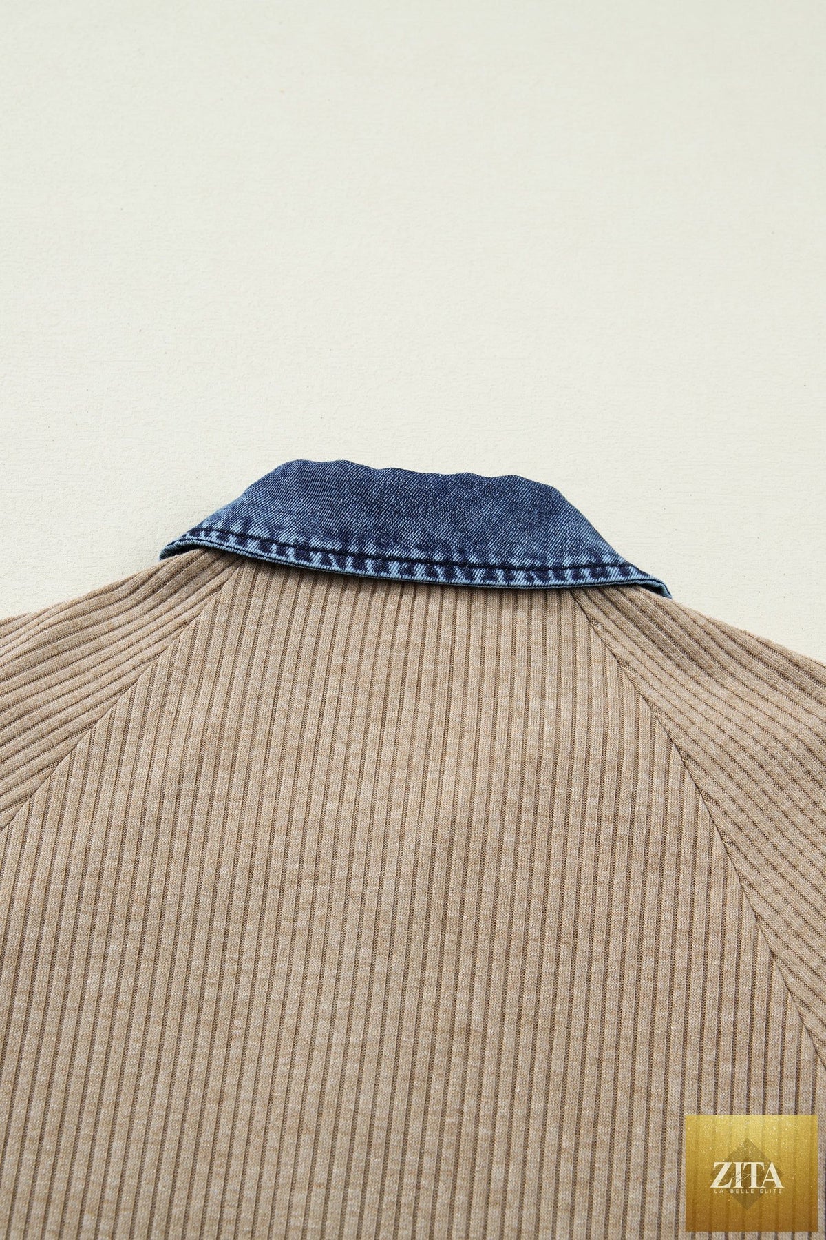 Beige ribbed knit denim patchwork long sleeve polo collar top with button details and cuffed sleeves, by Wild and Free Boutique.