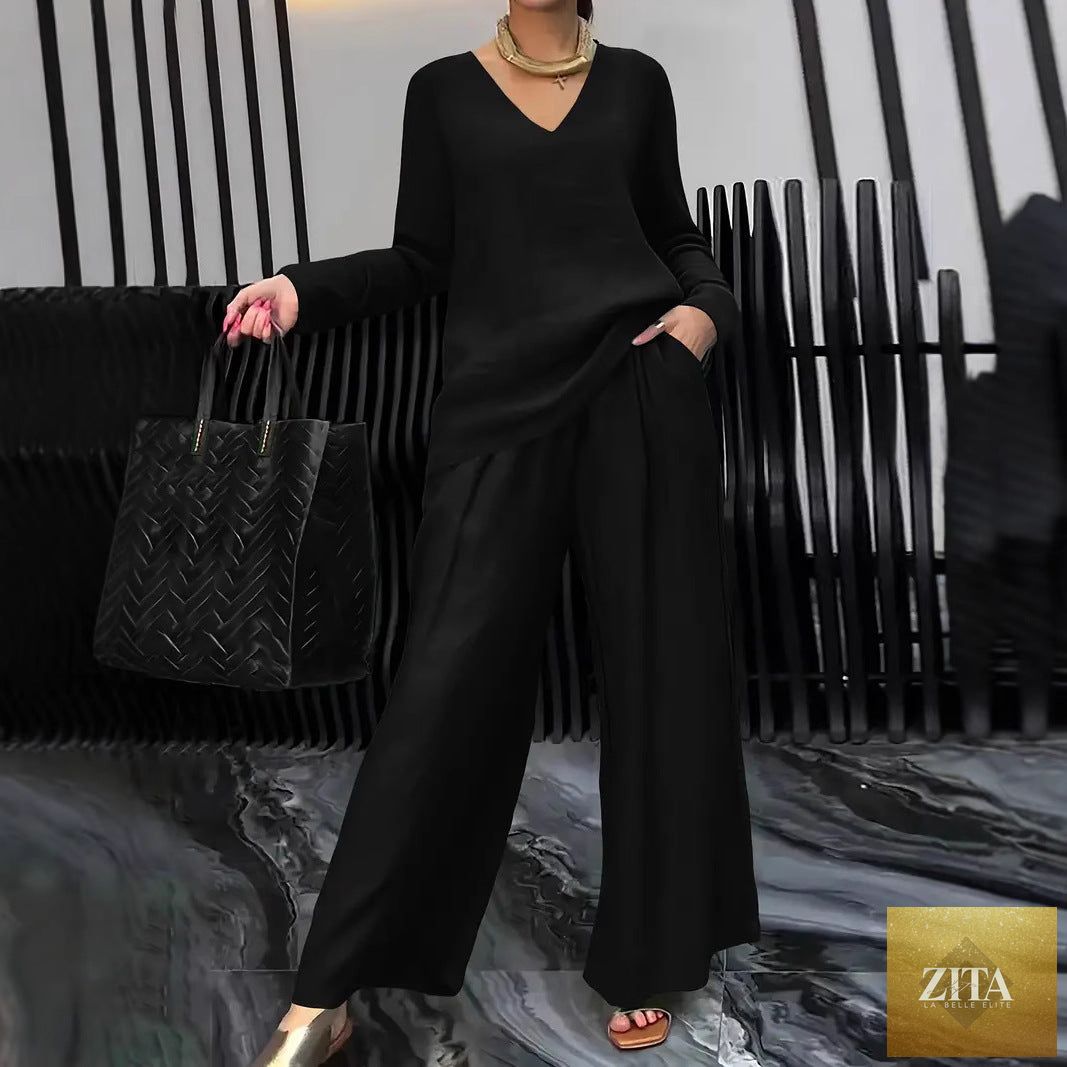 Solid color long sleeve top and pants two-piece travel set by FitiqueFit, casual and comfortable for travel or lounging.