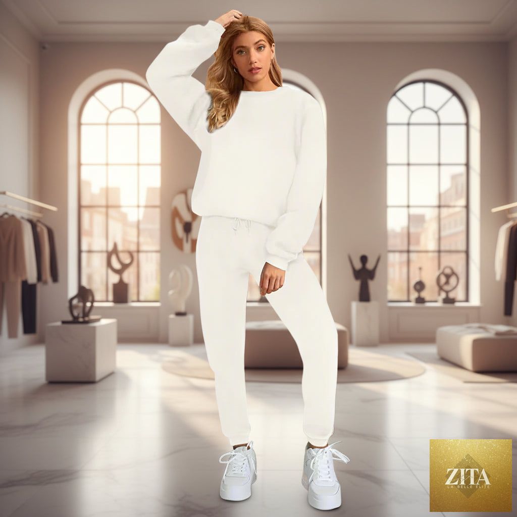Women's oversized MERIDGE sweatshirts and jogger pants two-piece set, relaxed fit with drop-shoulder design and comfortable fabric.