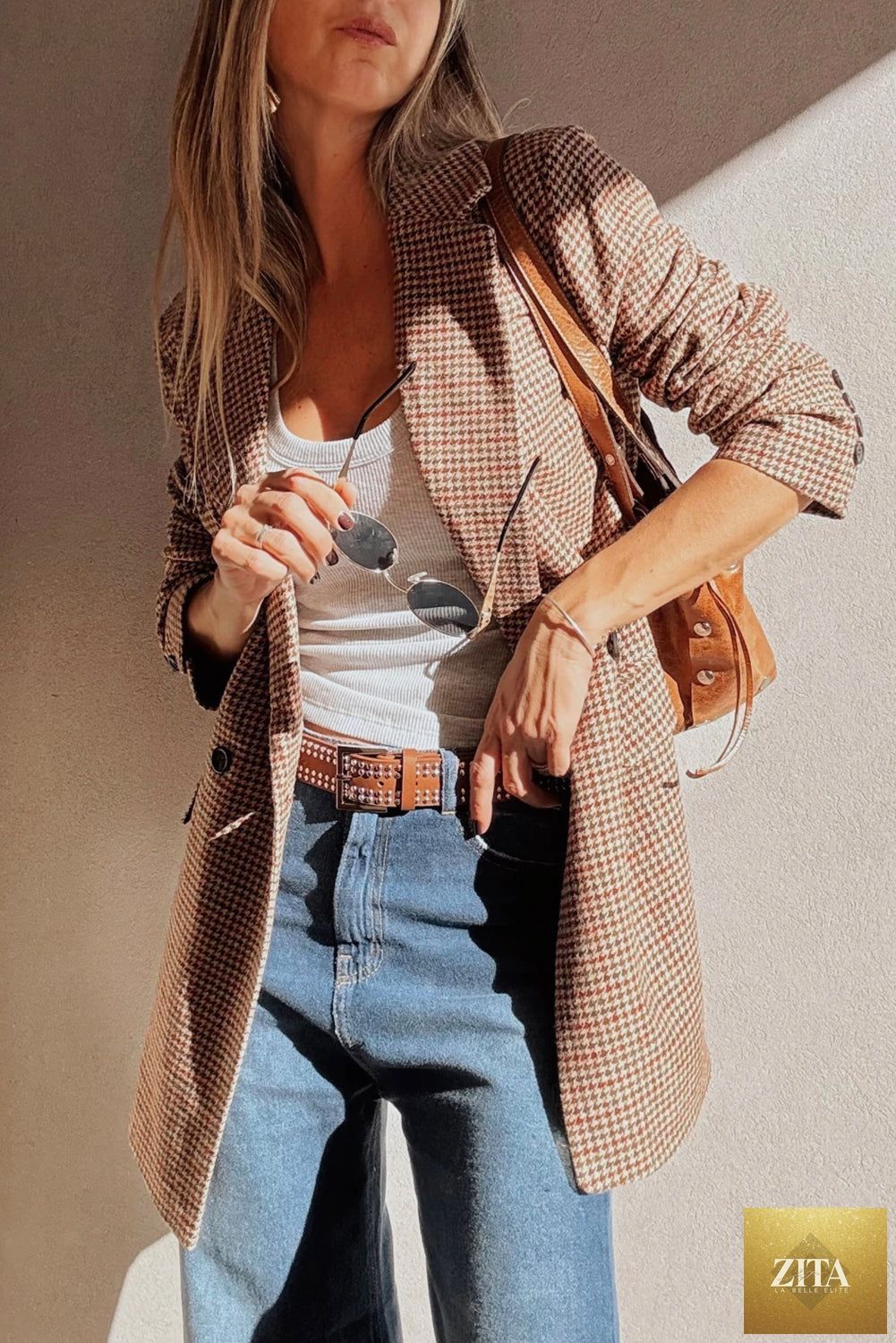 Brown houndstooth blazer with lapel collar from Femstylo, tailored fit, stylish design, suitable for professional or casual wear