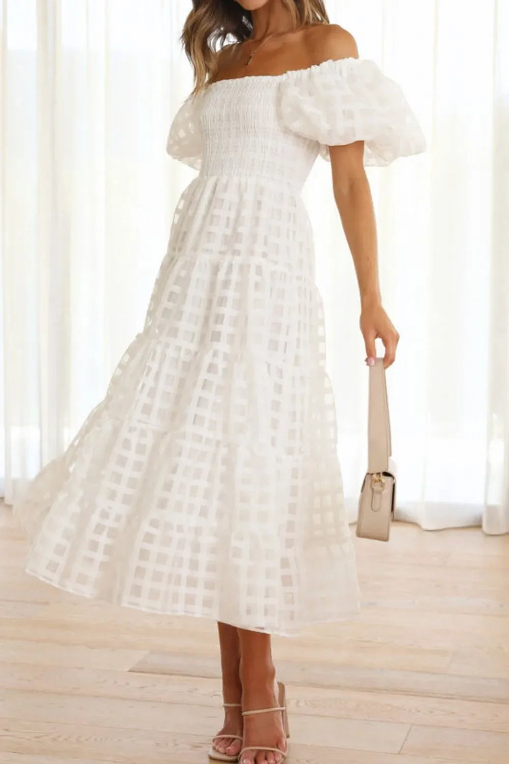 Off shoulder short puff sleeve midi dress by Shopiebay, featuring a stylish and elegant design perfect for casual or semi-formal wear.