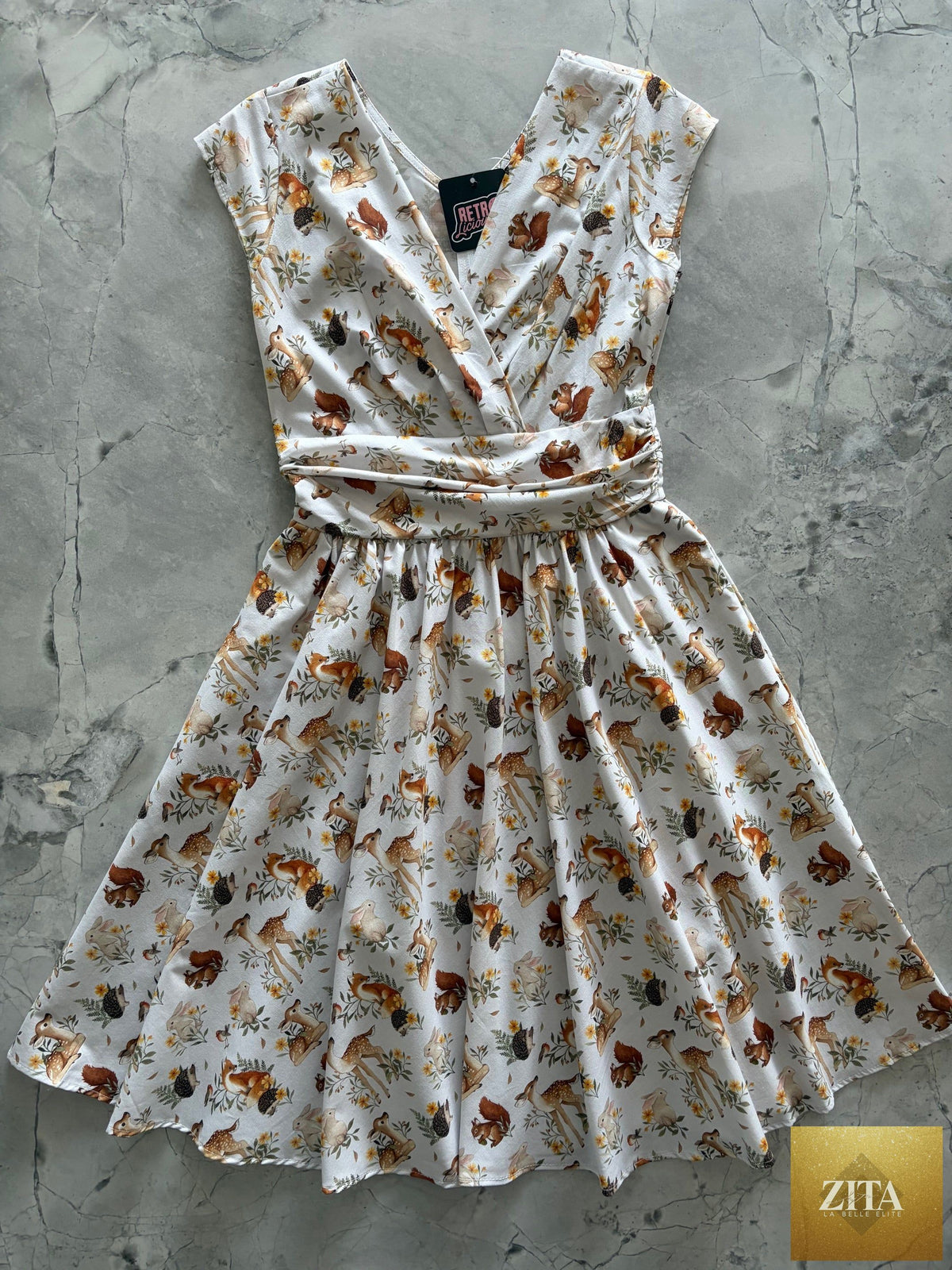 Retrolicious Woodland Animals Greta Dress featuring a charming woodland animal print and a playful, vintage-inspired design.