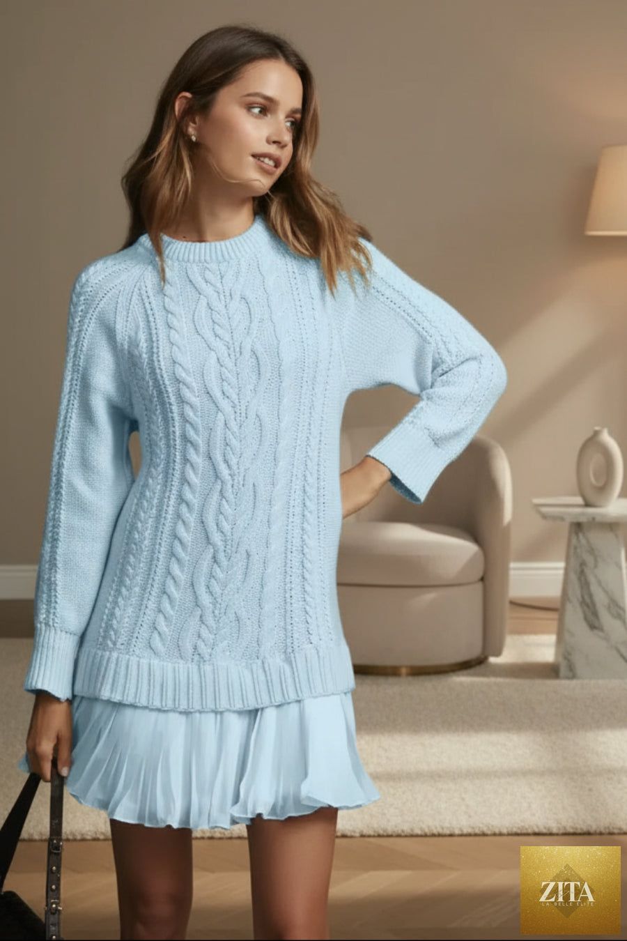Oversized cable knit sweater with round neck by FitiqueFit, featuring cozy textured knit in a neutral color.