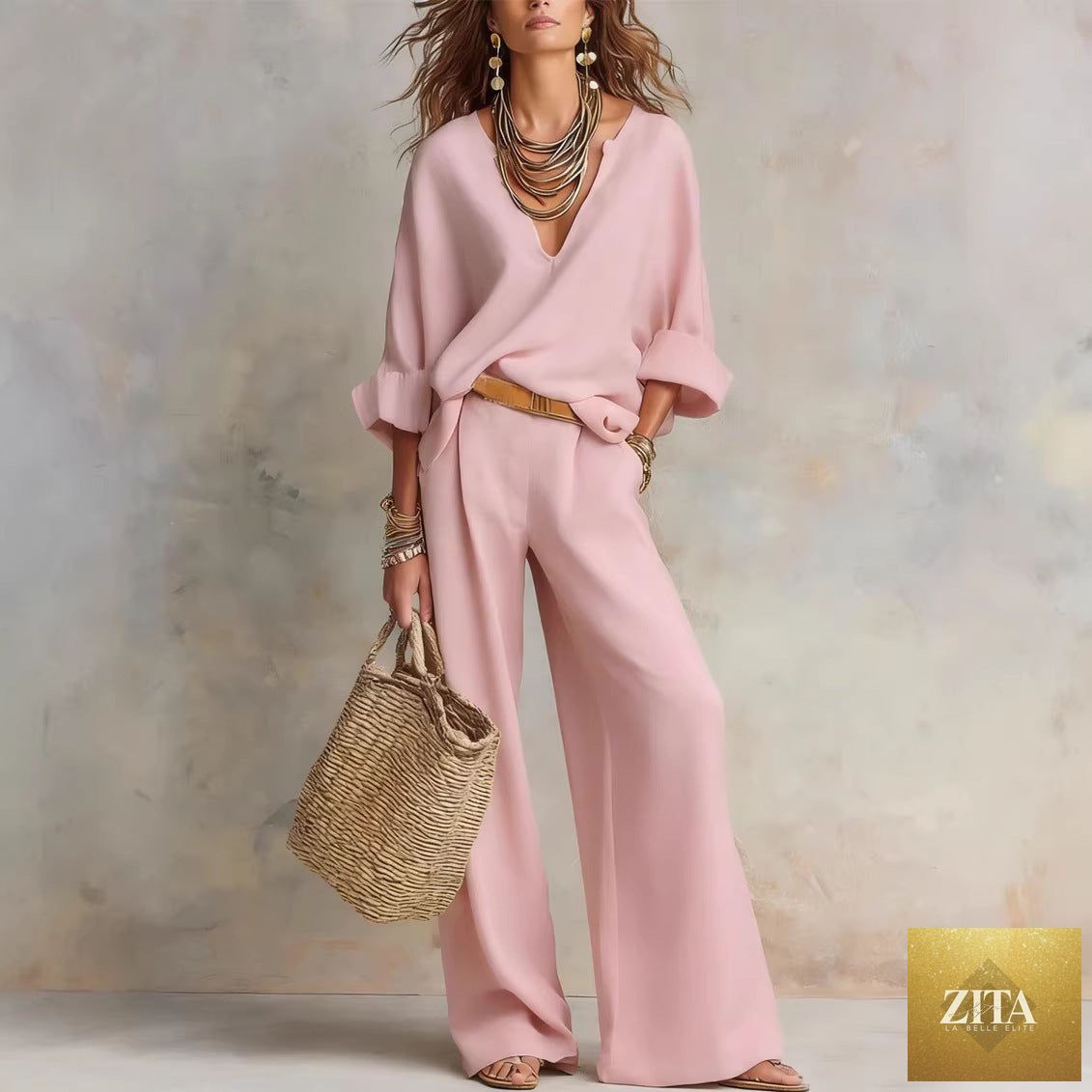 Women's casual linen vacation set by Zita La Belle Elite featuring a three-quarter sleeve top and full-length pants.