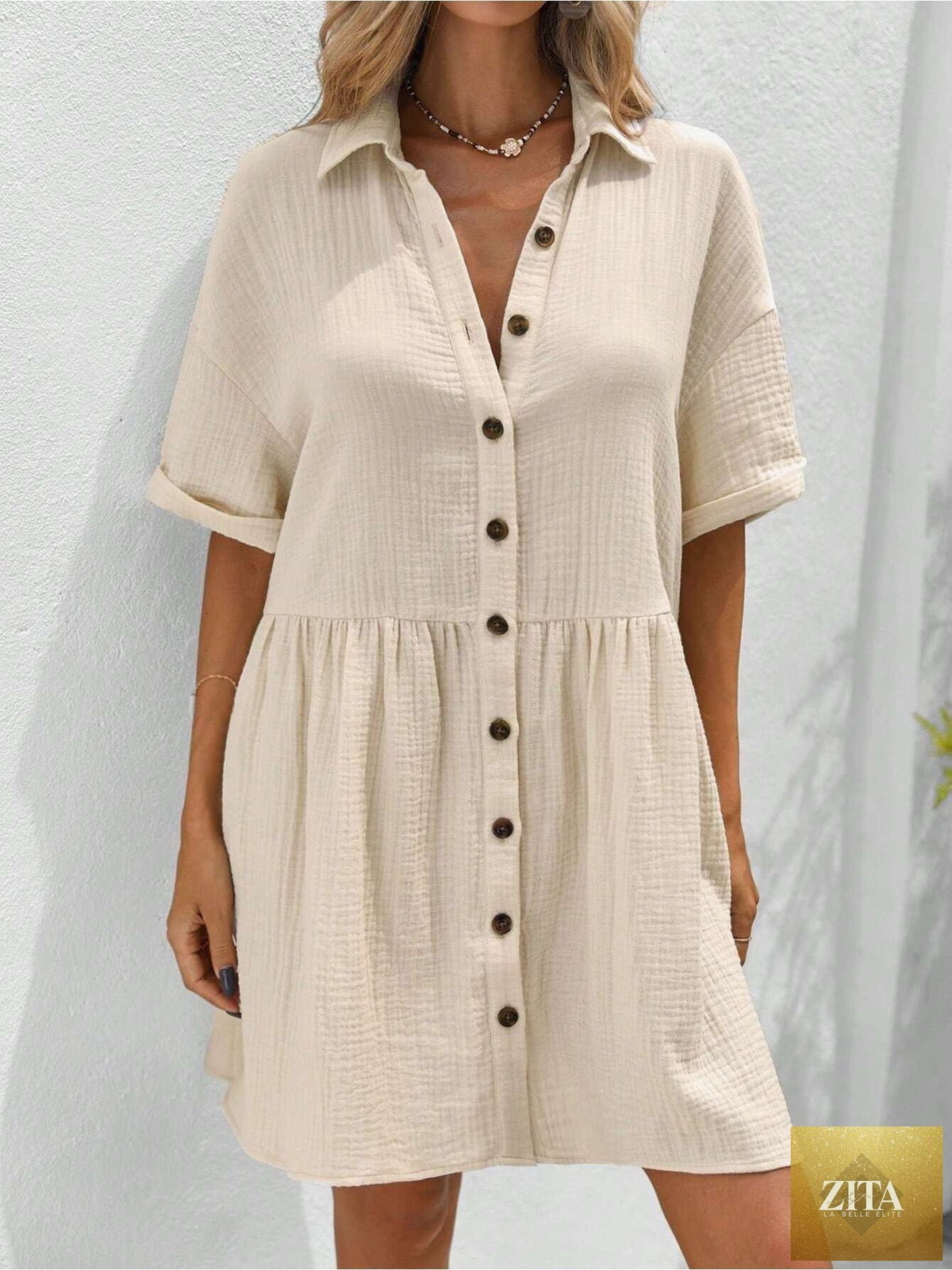 Women’s ruffle hem shirt dress by Zita La Belle Elite, loose fit casual summer holiday wear with short sleeves and ruffle detail.