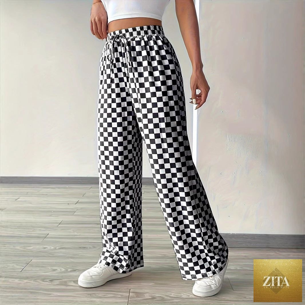 Checkerboard high-waisted wide-leg pants by Zita La Belle Elite in four colors, featuring bold pattern and relaxed fit.