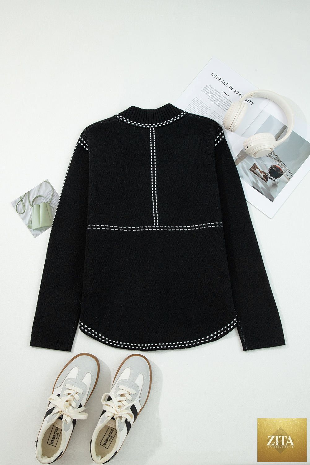 Black contrast trim button-up sweater cardigan from Wild and Free Boutique, featuring a classic design and knit fabric.