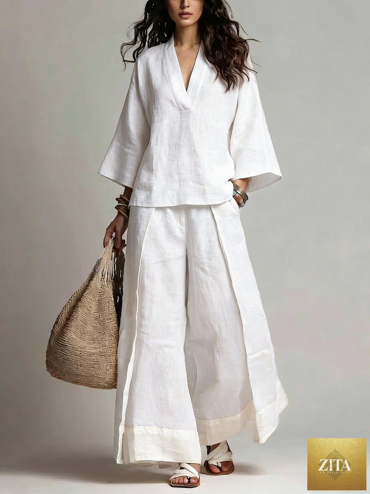 Women's cotton-linen V-neck shirt and wide-leg pants set by FitiqueFit, featuring a 3/4 sleeve top and relaxed trousers.