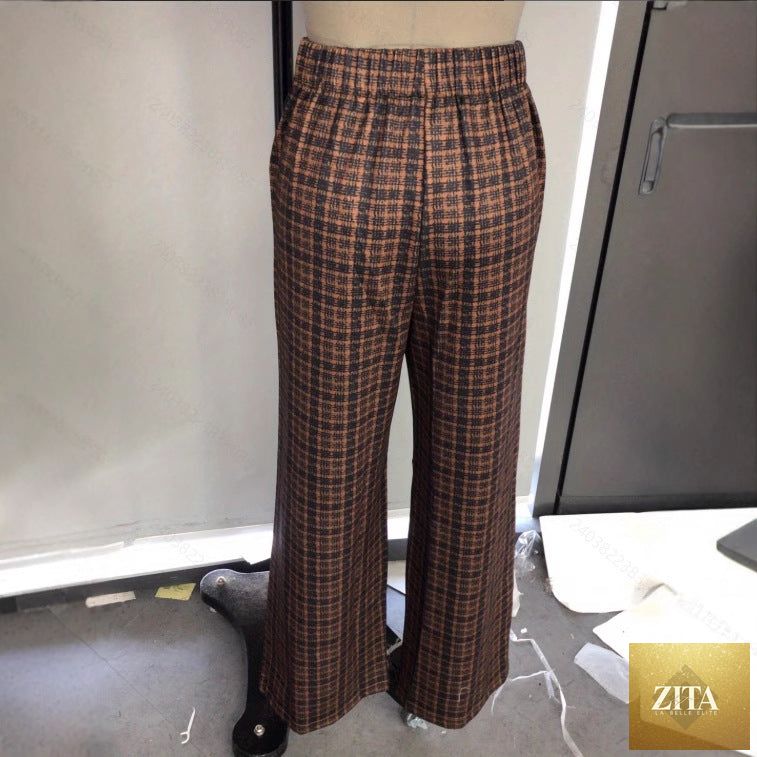 High-waisted plaid and striped retro pants by The Fashion Celestial, stylish commuter bottoms for spring and summer.