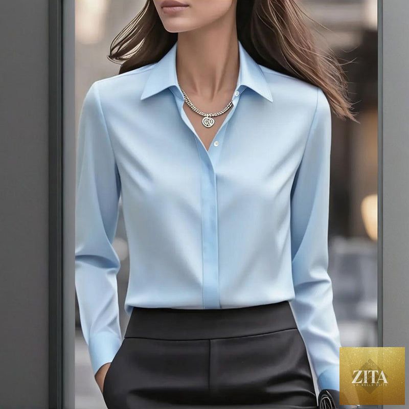 Loose fit satin blouse by FitiqueFit with V-neck, long sleeves, ideal for office or casual wear, shown in soft satin fabric.