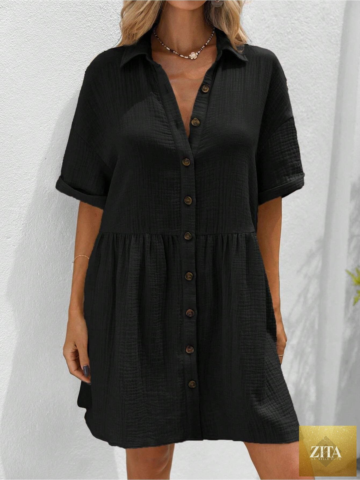 Women’s ruffle hem shirt dress by Zita La Belle Elite, loose fit casual summer holiday style, shown on a model.