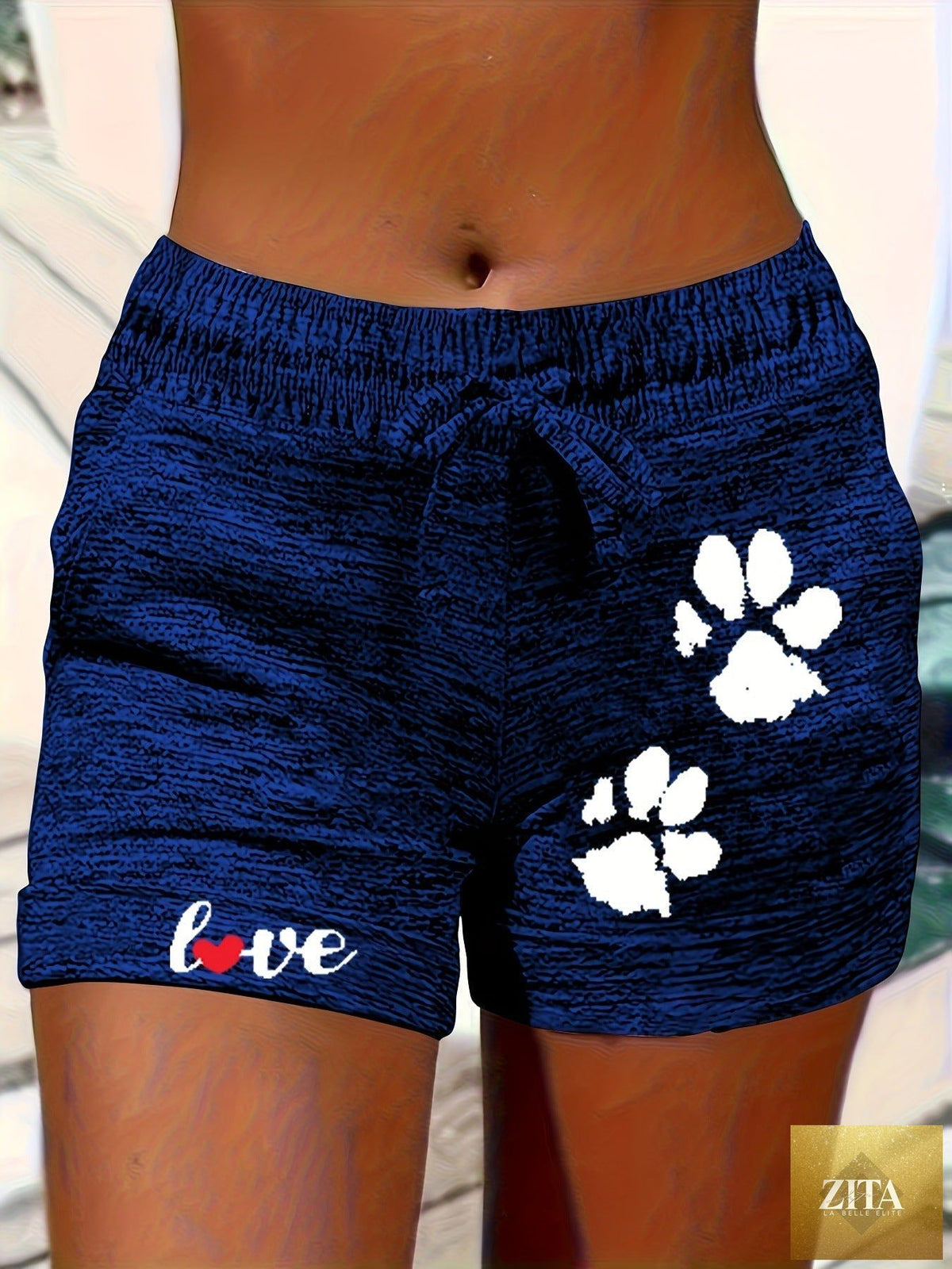 Women's printed elastic waist cropped shorts with pockets by Zita La Belle Elite, casualwear, showing the colorful print and side pockets.