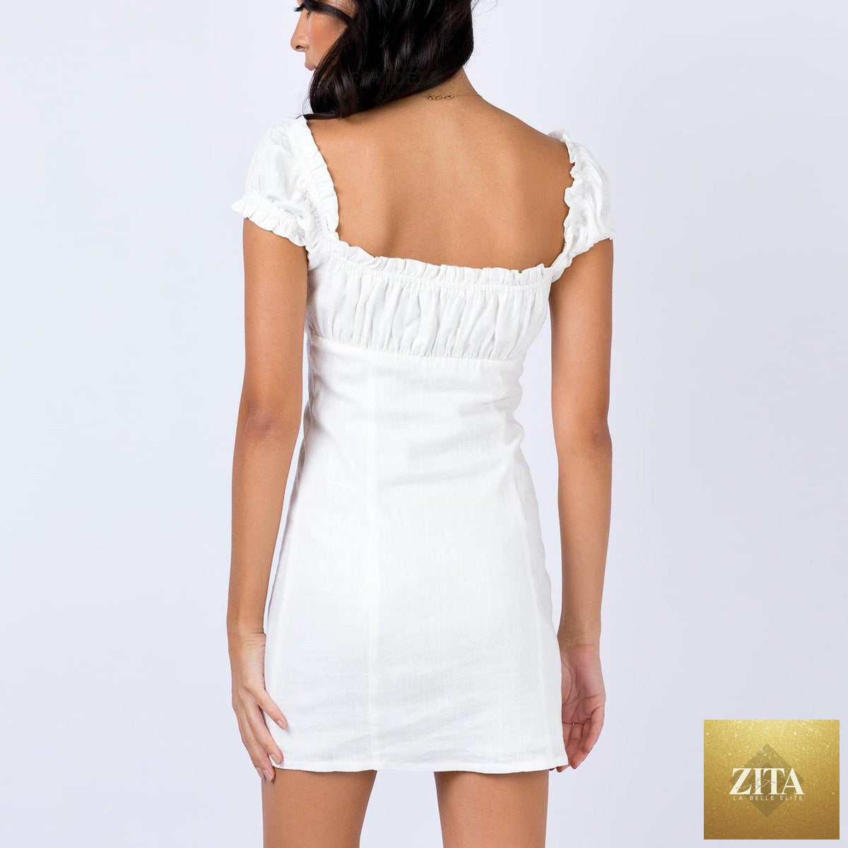 Woman wearing FitiqueFit women's off-shoulder lace-up puff-sleeve sheath dress, casualwear with a fitted silhouette and single-breasted design.