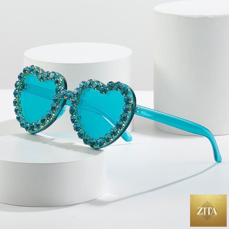 Peach heart-shaped rhinestone sunglasses with Y2K style from FitiqueFit, trendy eyewear with sparkling rhinestone details.