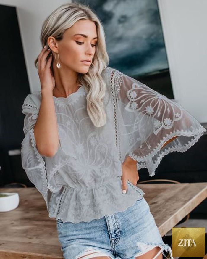Women’s casual lace trim short sleeve batwing top by FitiqueFit, featuring lightweight fabric and stylish design.