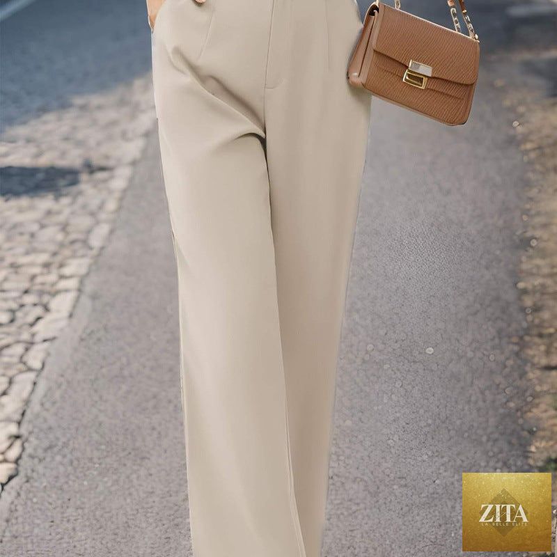 Women’s elegant casual suit pants with pockets from FitiqueFit, featuring a tailored fit and classic office trouser style.