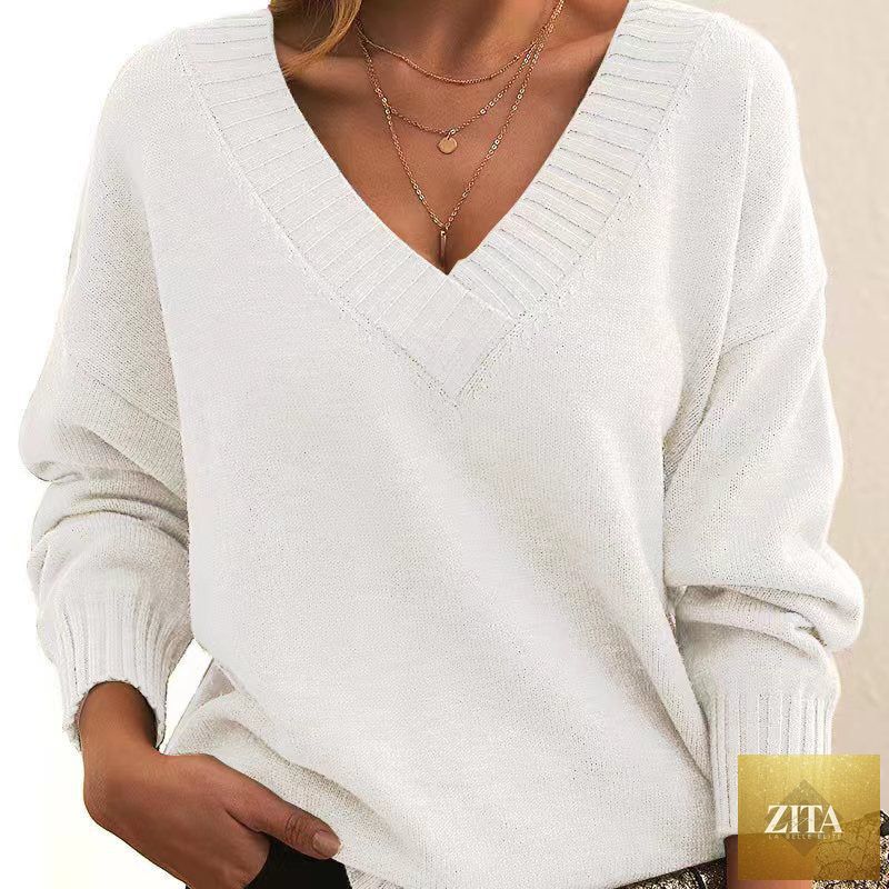 Women’s V-neck drop shoulder sweater by FitiqueFit, casual long sleeve pullover, soft knit fabric, in a relaxed fit.