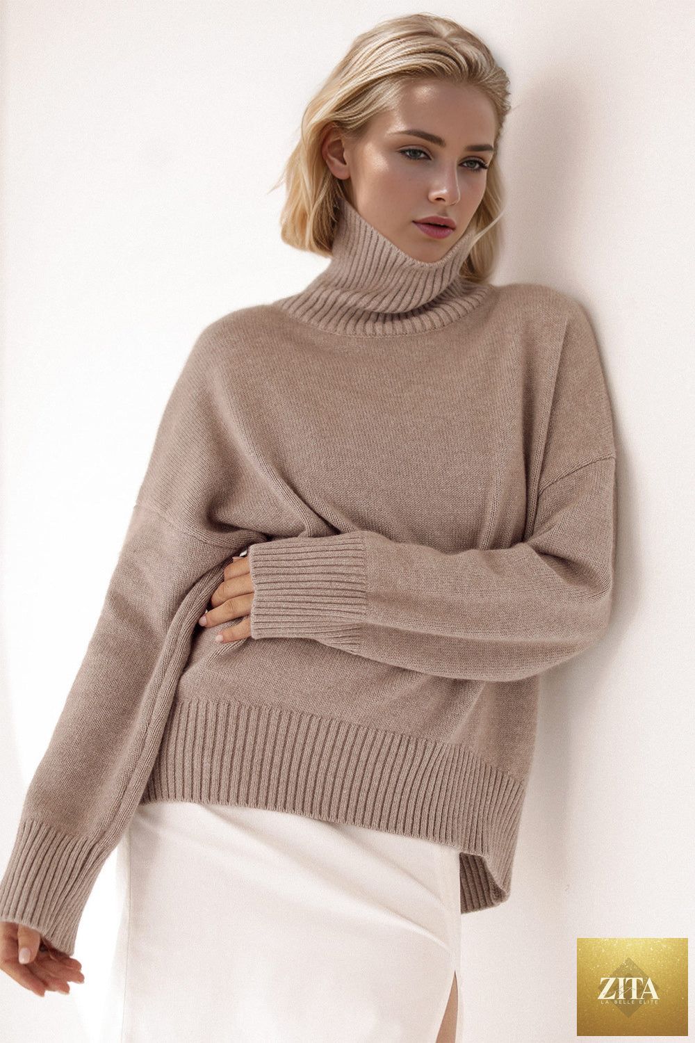 ShopBasicbae Basic Bae turtleneck sweater with dropped shoulders and long sleeves, displayed in a cozy, neutral-toned knit design.